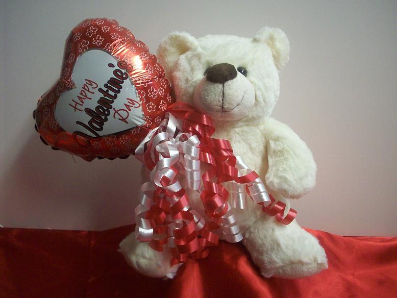 Valentine bear holding balloon